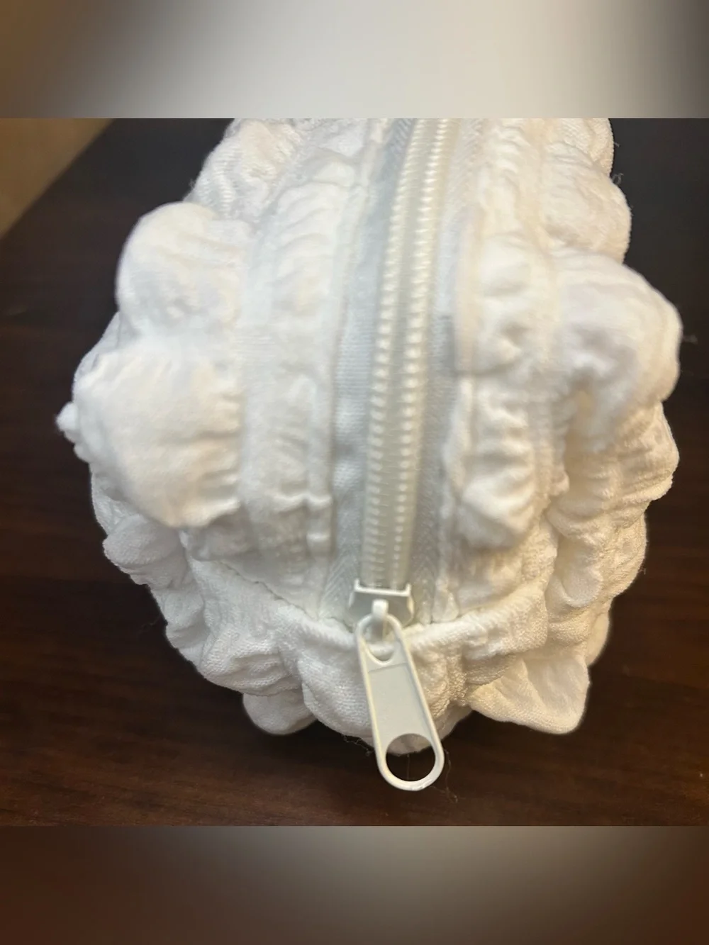 Medicube White Quilted Makeup Bag w/ Ruffles